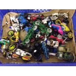 A tray of plastic motorcycles.