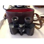 A pair of vintage Kylos binoculars in case