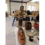 2 African carved wooden tribal items - from Zululand c1960s. A mask and a figure with knobkerrie,