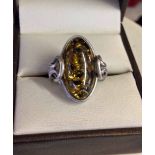 Ladies 925 silver ring with large oval amber cabouchon, size P