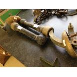 A pair of vintage brass beer pump handles.