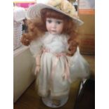 'Janice' - Alberon Dolls, collectible porcelain doll on stand. Dress designed by Allison Mills