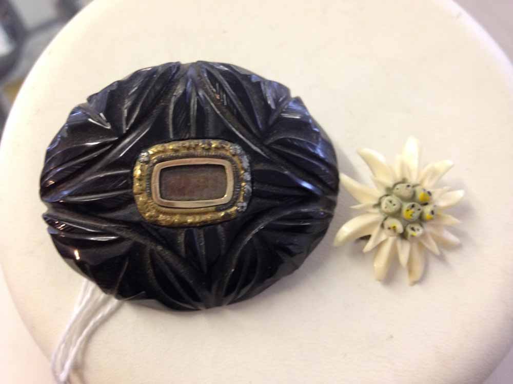 Antique Whitby Jet oval carved mourning brooch, with central compartment - possibly for hair,