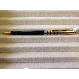 Gyro Point c1950 propelling pencil. Black glossy barrel with a rolled gold cone and cap, which has a