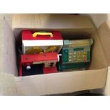 A box of vintage toys comprising a Maxicash cash register, a Fisher Price music box/record player