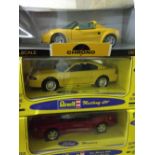 3 1:18 scale model cars: A Chrono Lotus Elise together with a Revell Ford Mustand Cobra 500 Indie