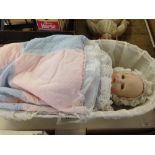 A boxed porcelain doll in carry cot 'A Bundle of Joy' by Danbury Mint
