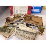 Quantity of vintage postcards.