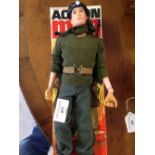 An original 1960s boxed Action Man figure in original uniform with rifle. Gripping hands & flock