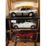 3 Maisto 1:18 scale model cars: boxed Alfa Romeo Spider, boxed Ford GT 90 and an unboxed Mercedes