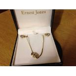 A 9ct gold & diamond linked heart necklace and earring set. Total weight approx 9g.