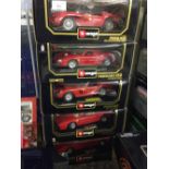 5 boxed Bburago 1:18 scale red Ferraris: Testerossa ('84), GTO ('84), Testerossa ('57), 250 Le