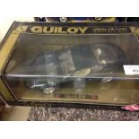 A boxed Guiloy 1:18 scale Aston Martin DB7 in green.