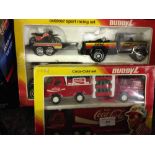 2 boxed Buddy L model sets: Outdoor Sport Racing set and Coca-Cola set.