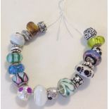 18 silver and glass beads with silver cores for Pandora style bracelets.