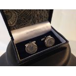 A boxed pair of Liberty silver plated cufflinks.