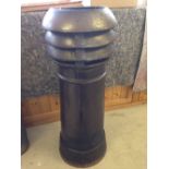 A vintage dark brown, fluted top chimney pot, approx 97cm tall.