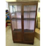 A vintage display cabinet 92cm x 168cm