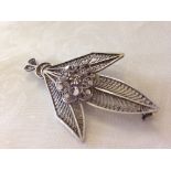 Silver filigree brooch