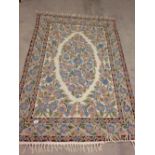 An Eastern pattern woolwork rug/wall hanging. Approx 180 x 118cm.