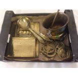 A collection of brassware to include a vintage letter rack, small urn, possibly trench art spoons