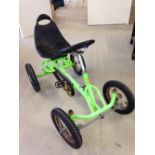 A childs 'Cobra' fluorescent green pedal go-kart