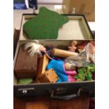 A vintage Globetrotter suitcase containing a quantity of old toys to include wooden chess set (