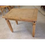 A Corona pine coffee/side table, 66cm x 44cm x 55cm tall.