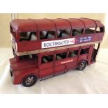 A tinplate routemaster bus 50cm long.