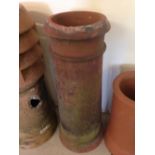 A vintage red coloured chimney pot 75cm (29.5") tall.