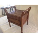 A Victorian commode with turned handles and legs.