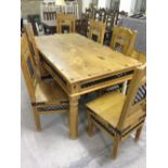 A Corona style pine kitchen/dining room table and 6 chairs.