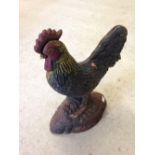 A cast iron painted cockerel doorstop, 29cm tall.