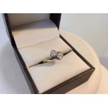 An 18ct gold & diamond ring set with 2 diamonds, each stone approx 0.2 carat. Size K.