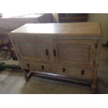 A vintage limed oak sideboard.