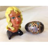 A cloisonne egg together with a small ceramic Art Deco bust of a woman approx 8cm tall.