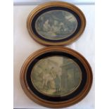 2 country scene prints in gold oval frames.