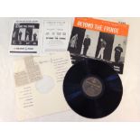 A 'Beyond The Fringe' mono LP record on the Parlophone label with a theatre program of the Beyond