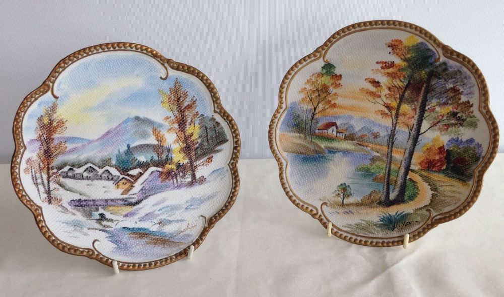 A pair of vintage Nippon 'Tapesty' signed plates.
