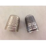 A HM silver thimble Chester 1907 maker HC & S Ltd with another white metal thimble maker G H.