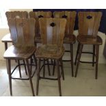 A set of 6 German oak bar stools.
