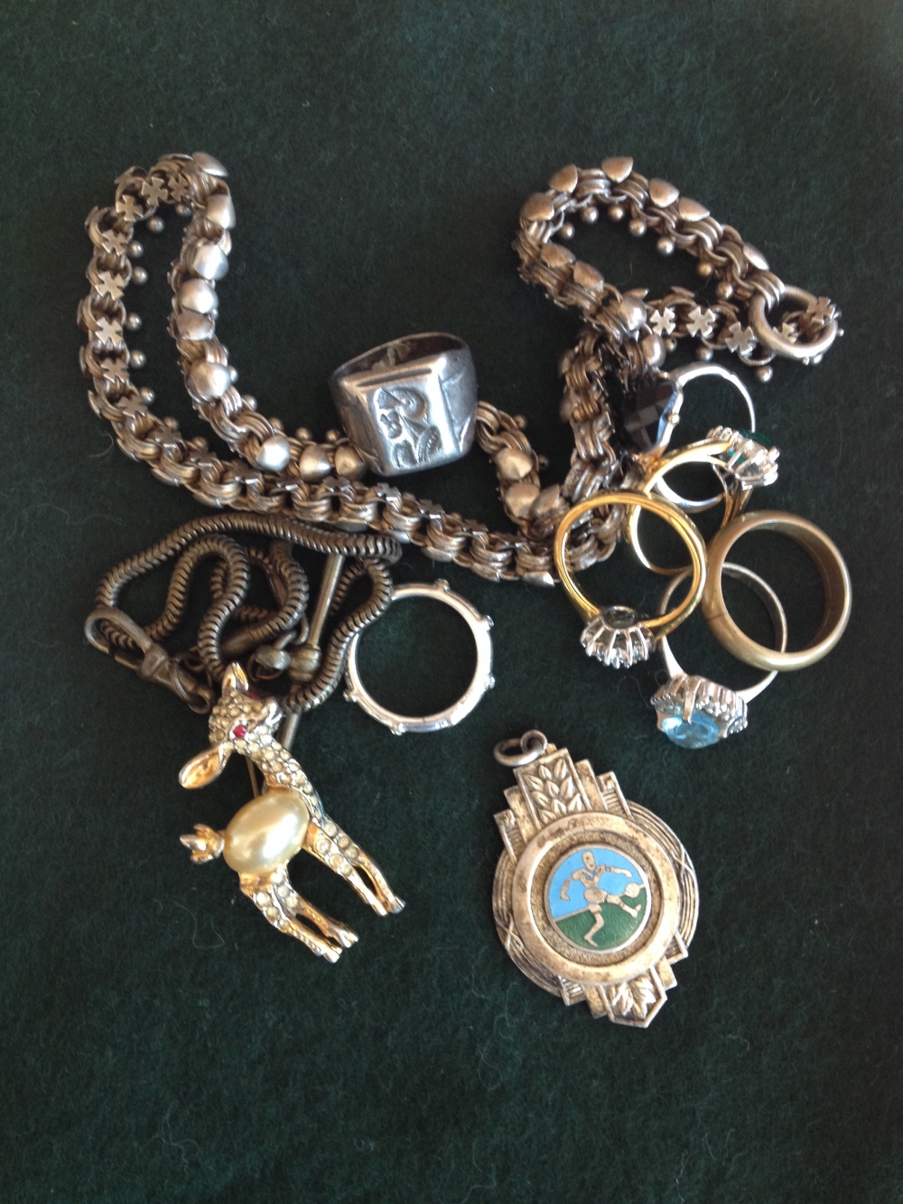 A small quantity of mixed jewellery to include a gents centurian ring and a football medal.