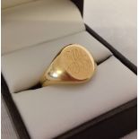 An 18ct gold signet ring size R, approx 7.9g. London 1918.