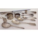 A quantity of HM silver items to include apostle sugar tongs & heavy napkin ring. Approx 200g