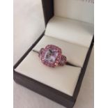 Very pretty ladies rose gold dress ring set with 3 Rose de France amethysts surrounded by pink