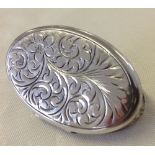 A large HM silver locket approx 4cm long.