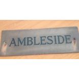 A heavy copper house plaque with the house name 'Ambleside'.