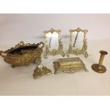 6 brass desk items to include 2 photograph frames, ink well, desk tidy, short candle stick and