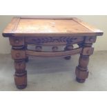 A square polished pine coffee table 61cm (24inch) square.