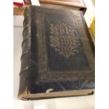 A large family Bible 'The Family Devotional Bible' by the Rev Matthew Henry and published by The
